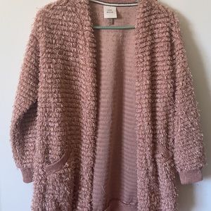 A rose fuzzy sweater